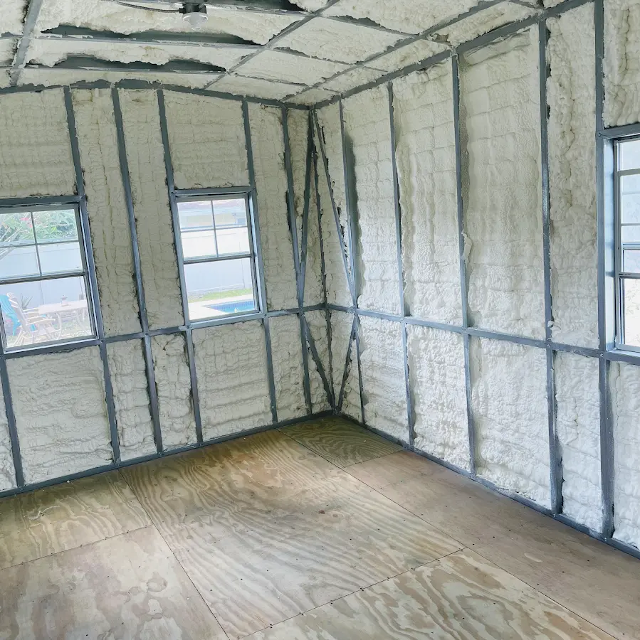 Closed-cell spray foam insulation applied to wall cavities in a residential project in Grapevine